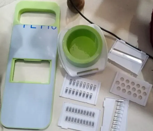 5in1-vegetable-cutter-stainless-steel-multifunctional-grater-for-vegetables-slicers-shredders-peeler-random-color - 7.webp